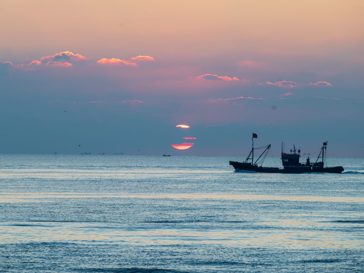A trawler heading out at sunrise — Dalian 大连, Liaoning, China